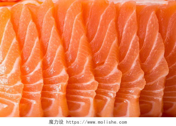 新鲜美味的生鱼片背景切成薄片的生鲑鱼